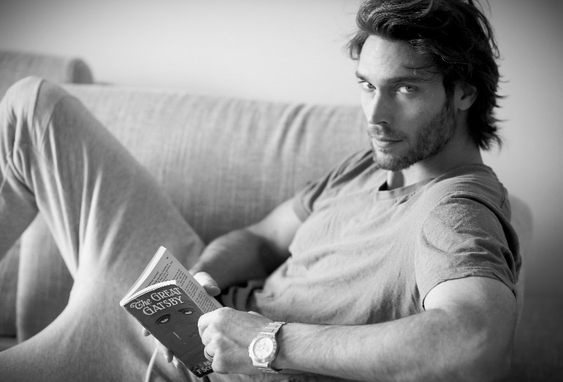 Donny Lewis holding The Great Gatsby.