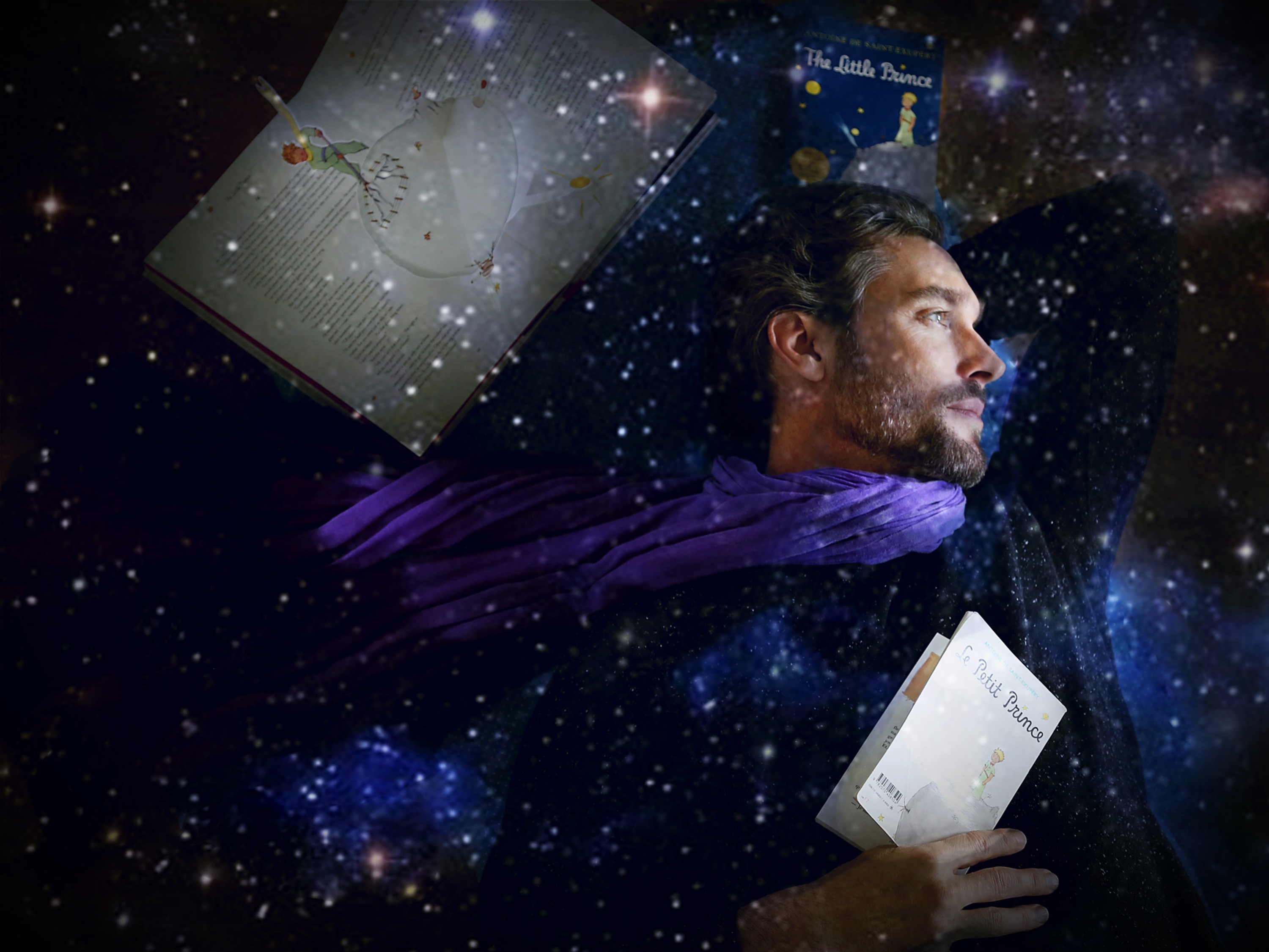 Donny Lewis holding Le Petit Prince.